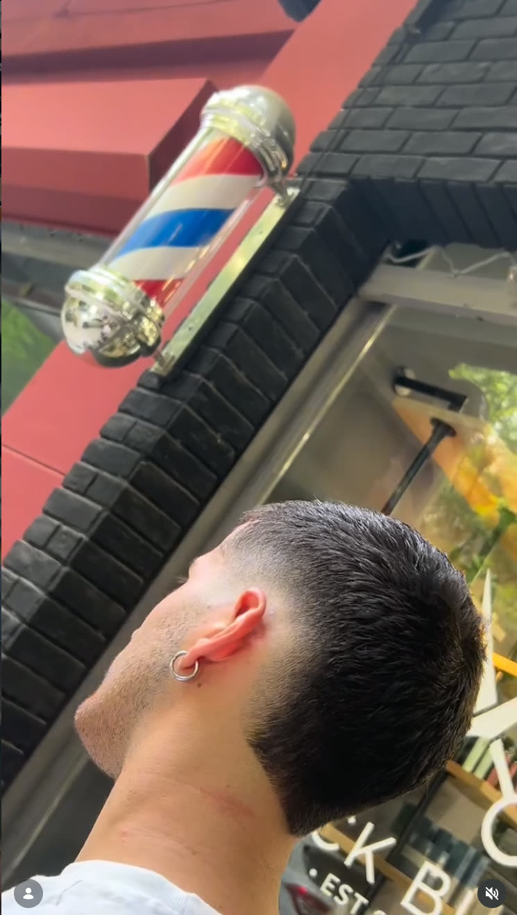 Barber pole outside the shop